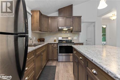 411 Shawanaga Lake Road, Dunchurch, ON - Indoor Photo Showing Kitchen With Double Sink