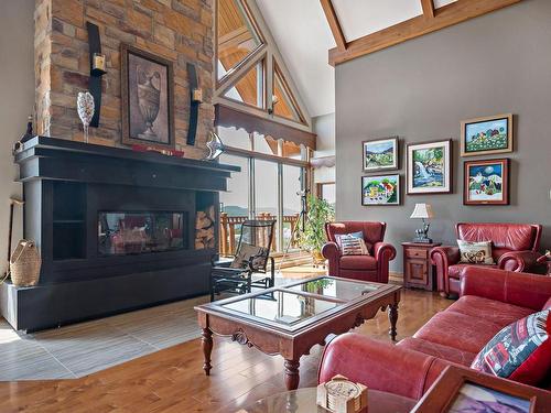 Salon - 10-168 Ch. Au Pied-De-La-Montagne, Mont-Tremblant, QC - Indoor Photo Showing Living Room With Fireplace