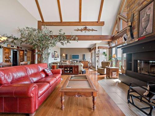 Salon - 10-168 Ch. Au Pied-De-La-Montagne, Mont-Tremblant, QC - Indoor Photo Showing Living Room With Fireplace