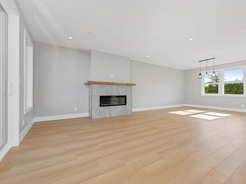 7065 Brailsford Pl, Sooke, BC - Indoor Photo Showing Living Room With Fireplace