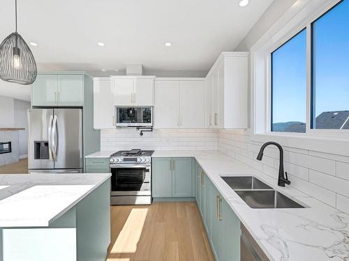 7063 Brailsford Pl, Sooke, BC - Indoor Photo Showing Kitchen With Double Sink With Upgraded Kitchen