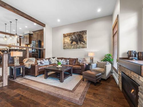 13-3280 Village Way, Sun Peaks, BC - Indoor Photo Showing Living Room With Fireplace