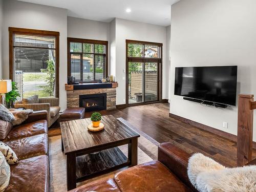 13-3280 Village Way, Sun Peaks, BC - Indoor Photo Showing Living Room With Fireplace