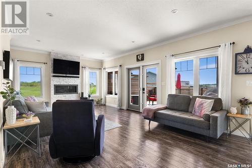 13 Hood Road, Longlaketon Rm No. 219, SK - Indoor Photo Showing Living Room With Fireplace