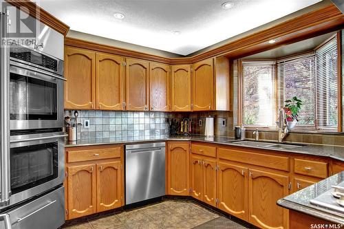 2347 Brodie Bay E, Regina, SK - Indoor Photo Showing Kitchen With Double Sink