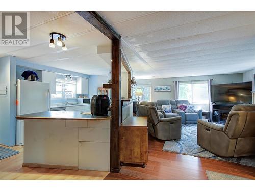 4075 Mcclain Road Unit# 51, Kelowna, BC - Indoor Photo Showing Living Room With Fireplace