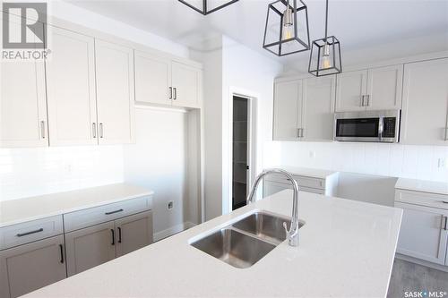 130 Kostiuk Crescent, Saskatoon, SK - Indoor Photo Showing Kitchen With Double Sink