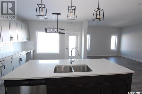 130 Kostiuk Crescent, Saskatoon, SK - Indoor Photo Showing Kitchen With Double Sink