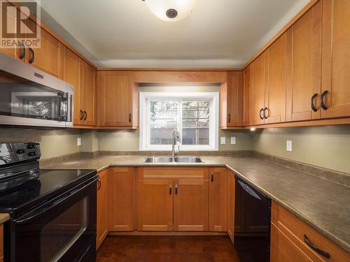 201 1638 6Th Avenue, Prince George, BC - Indoor Photo Showing Kitchen With Double Sink