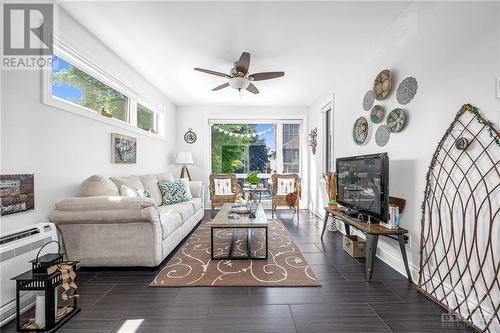 Gorgeous sunroom. - 303 Lanark Avenue, Ottawa, ON - Indoor Photo Showing Living Room