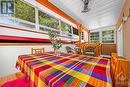 Covered porch for breezy summer days. - 303 Lanark Avenue, Ottawa, ON  - Indoor Photo Showing Other Room 