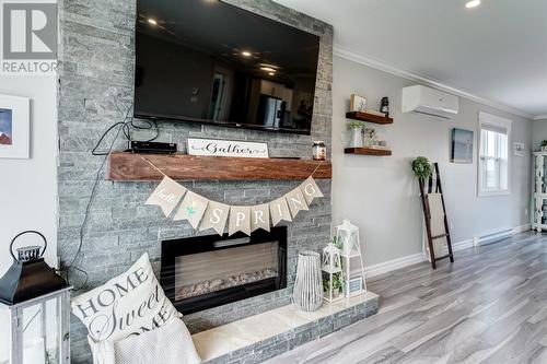 10 Reid Street, Upper Island Cove, NL - Indoor Photo Showing Other Room With Fireplace