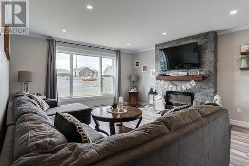 10 Reid Street, Upper Island Cove, NL - Indoor Photo Showing Living Room With Fireplace