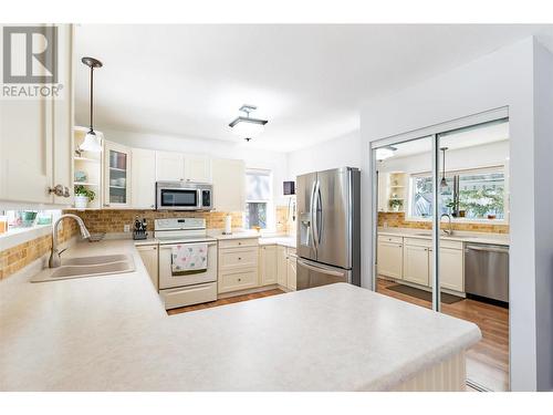 107 Crown Crescent, Vernon, BC - Indoor Photo Showing Kitchen With Double Sink