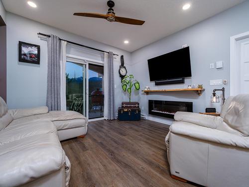 1302 - 410 5Th Avenue S, Golden, BC - Indoor Photo Showing Living Room With Fireplace