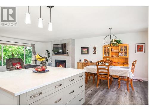 1807 22 Street, Vernon, BC - Indoor Photo Showing Dining Room With Fireplace