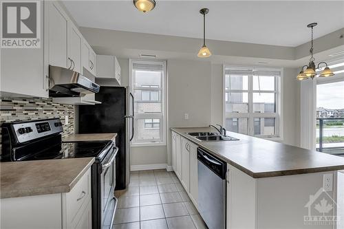 250 Glenroy Gilbert Drive Unit#304, Ottawa, ON - Indoor Photo Showing Kitchen With Double Sink