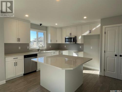 146 Kostiuk Crescent, Saskatoon, SK - Indoor Photo Showing Kitchen With Double Sink