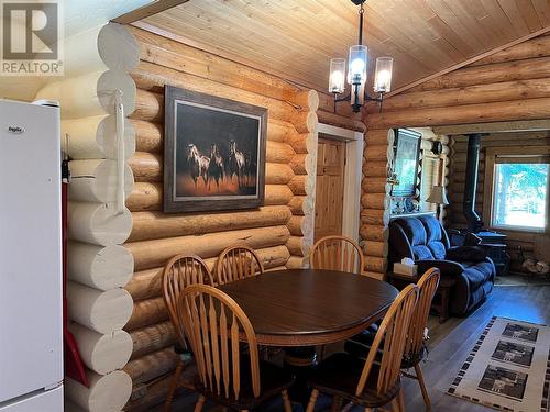 5822 97 Highway, Dawson Creek, BC - Indoor Photo Showing Dining Room With Fireplace