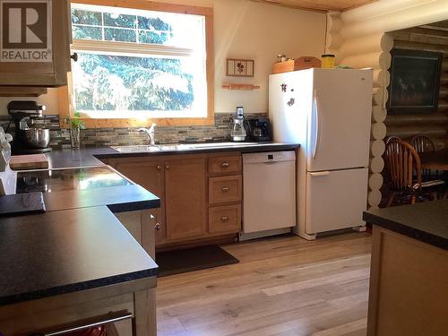 5822 97 Highway, Dawson Creek, BC - Indoor Photo Showing Kitchen With Double Sink