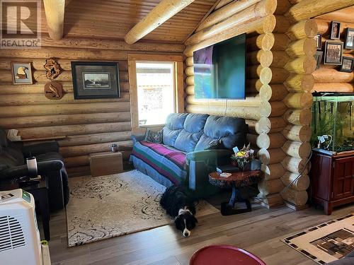 5822 97 Highway, Dawson Creek, BC - Indoor Photo Showing Living Room With Fireplace