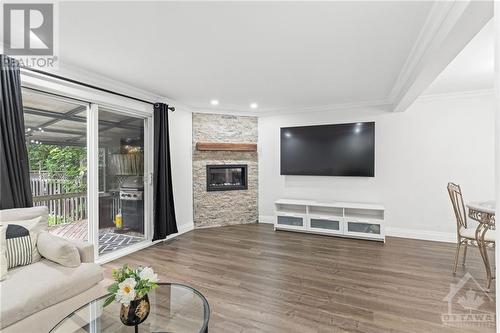 1740 Lafrance Drive, Ottawa, ON - Indoor Photo Showing Living Room With Fireplace