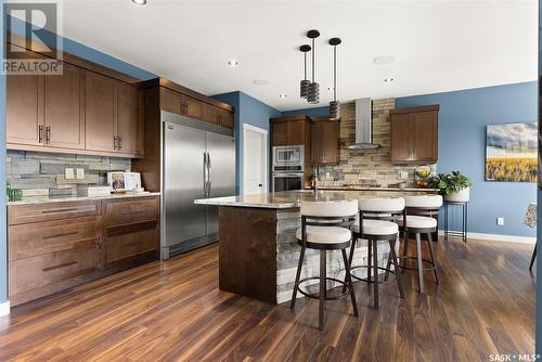 18 Cumberland Bay, White City, SK - Indoor Photo Showing Kitchen With Stainless Steel Kitchen With Upgraded Kitchen