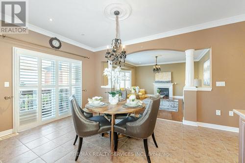 21 Crown Drive, Brampton (Vales Of Castlemore), ON - Indoor Photo Showing Dining Room With Fireplace