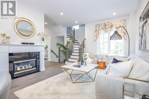 77 Leitchcroft Crescent, Markham (Commerce Valley), ON - Indoor Photo Showing Living Room With Fireplace