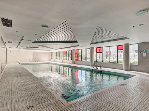 Pool - 1202-4239 Rue Jean-Talon O., Montréal (Côte-Des-Neiges/Notre-Dame-De-Grâce), QC - Indoor Photo Showing Other Room With In Ground Pool