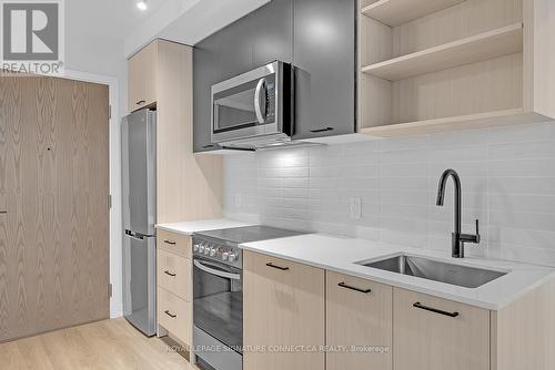 623 - 2300 St Clair Avenue W, Toronto (Junction Area), ON - Indoor Photo Showing Kitchen With Upgraded Kitchen