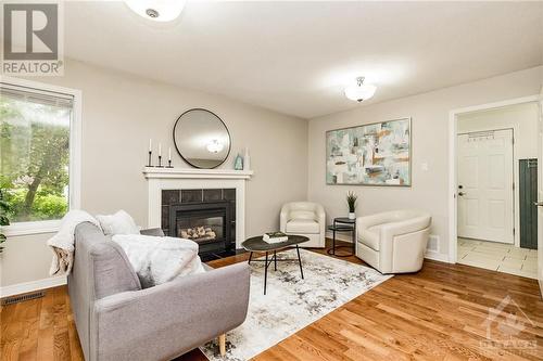 24 Mary Hill Crescent, Richmond, ON - Indoor Photo Showing Living Room With Fireplace