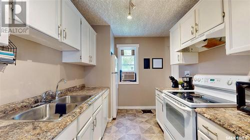 1438 Connaught Street, Regina, SK - Indoor Photo Showing Kitchen With Double Sink