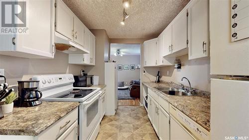 1438 Connaught Street, Regina, SK - Indoor Photo Showing Kitchen With Double Sink