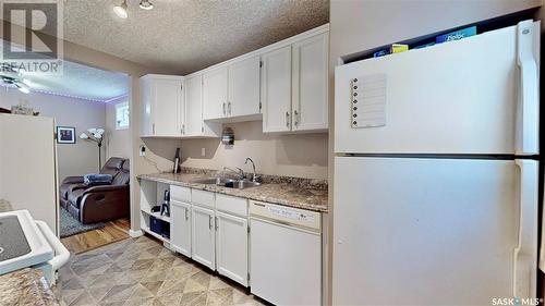 1438 Connaught Street, Regina, SK - Indoor Photo Showing Kitchen With Double Sink