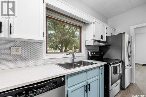 1208 Coteau Street W, Moose Jaw, SK - Indoor Photo Showing Kitchen With Stainless Steel Kitchen With Double Sink