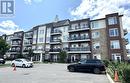 310 - 54 Sky Harbour Drive, Brampton (Bram West), ON  - Outdoor With Balcony With Facade 