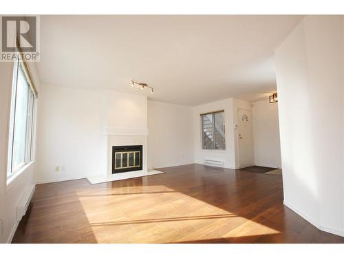 320 Brandon Avenue Unit# 107, Penticton, BC - Indoor Photo Showing Living Room With Fireplace