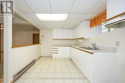 20 Tall Pines Drive, Tiny, ON - Indoor Photo Showing Kitchen With Double Sink