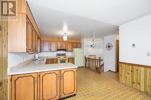 20 Tall Pines Drive, Tiny, ON - Indoor Photo Showing Kitchen With Double Sink