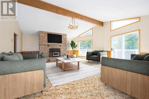 20 Tall Pines Drive, Tiny, ON - Indoor Photo Showing Living Room With Fireplace