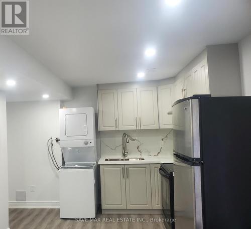 Basmnt - 12 Crystalview Crescent, Brampton, ON - Indoor Photo Showing Laundry Room