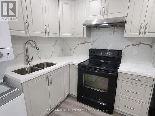 Basmnt - 12 Crystalview Crescent, Brampton, ON - Indoor Photo Showing Kitchen With Double Sink