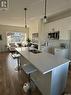 147 Kostiuk Crescent, Saskatoon, SK  - Indoor Photo Showing Kitchen With Double Sink 