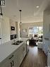 147 Kostiuk Crescent, Saskatoon, SK  - Indoor Photo Showing Kitchen With Double Sink 