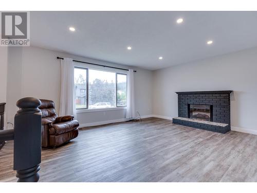 3656 Hesse Place, Prince George, BC - Indoor Photo Showing Living Room With Fireplace