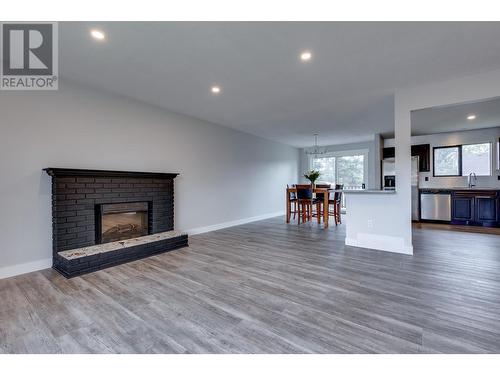 3656 Hesse Place, Prince George, BC - Indoor Photo Showing Living Room With Fireplace