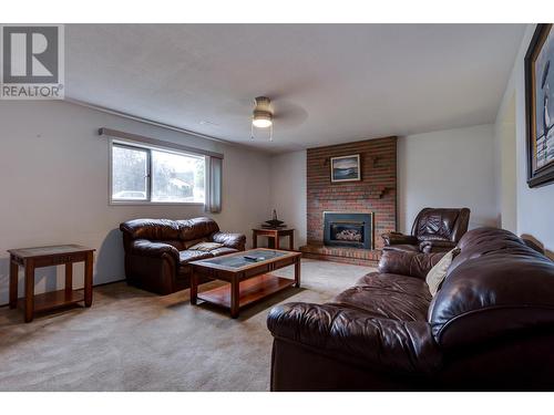 3656 Hesse Place, Prince George, BC - Indoor Photo Showing Living Room With Fireplace