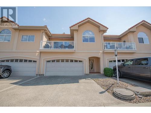 7701 Okanagan Landing Road Unit# 8, Vernon, BC - Outdoor With Balcony With Facade