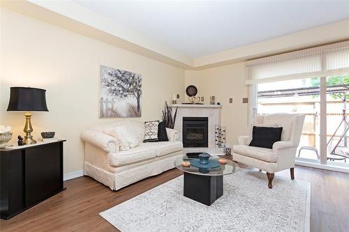 2025 Cleaver Avenue|Unit #32, Burlington, ON - Indoor Photo Showing Living Room With Fireplace